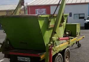 Engine Repair Work on Skip Bin Loader