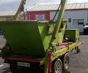 Engine Repair Work on Skip Bin Loader