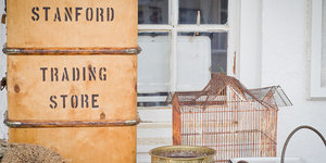 There are many shops and antique stores to browse through in the lively village.