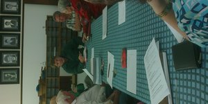 n Deel van die feeskomitee