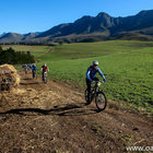 Riding alongside haystacks