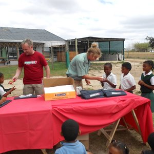 Andries and Dylan giving out treats and smiles