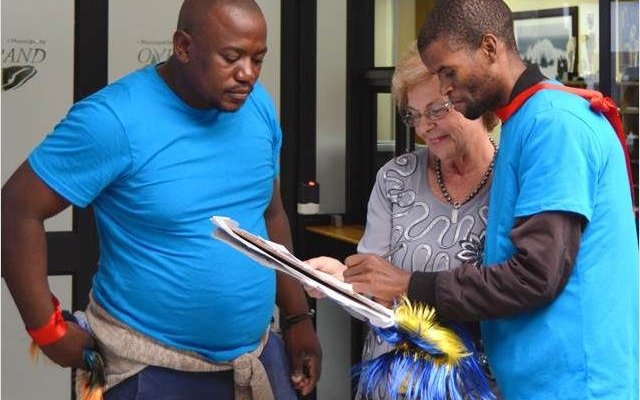 Executive Mayor Nicolette Botha-Guthrie (centre) receiving a â€œMemorandum of Awareness and Supportâ€ petition  from Siyabonga Vonco (right) and Mziwamakhosi Yiko-Skosana (left) of The Hermanus Rainbow Trust community development organisation. 