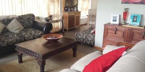 Lounge with walkthrough to dining room