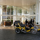 We collect you at your hotel in style.