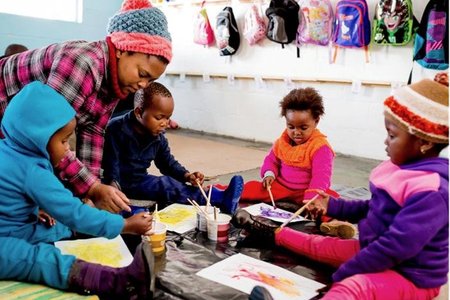 Children painting at Flower Valley Early Learning Centre