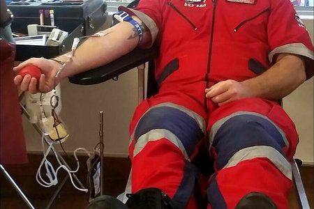 Derrick Banks, ER24 Hillcrest Branch Manager, donates blood.  