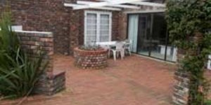 Enclose garden with build braai