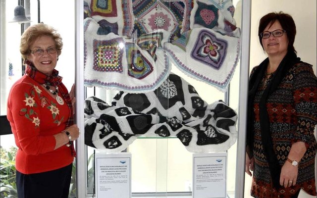 The spectacular multicoloured and black and white blankets that have been crocheted by Estrellita Engelbrecht and Jane Langenhoven and their respective teams of ladies from the â€œHooked on Tuesdayâ€ Club are currently  on  display in the glass cabinet in front of the Hermanus Library. For those wanting to partake, raffle tickets are available at the Hermanus Library at a cost of R50 each for the multi-coloured blanket and R30 each for the black and white one.  Executive Mayor Nicolette Botha-Guthrie and Councillorsâ€™ Secretary Doret Taljaard pictured with the two specially handcrafted crocheted blankets that will be raffled to raise funds for various projects under the banner of the Nicolette Botha-Guthrie Charity Fund. 