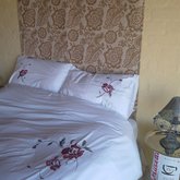 Queen sized bed with heated under blanket