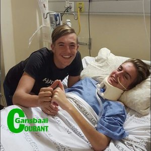 Calvin Olivier is flanked by his friend Ruben Rutzen