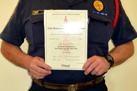 Overstrand Fire Safety Officer, Joe Schoeman proudly displays his Level 4 Safety Certificate which he obtained earlier this year through the UK-based Institute of Fire Engineers.