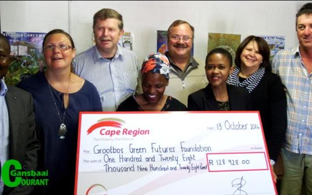 The hand over of South Africa Breweriesâ€™ cheque for the Food Security Project. Front fltr Xolani Msweli  (Councilor Ward 1), Lily Upton (Gansbaai Community Farm, Project Manager), Zholehanyo Bikani (Assistant Farm Manager and Facilitator) and Thandi Ndlungwana (South African Breweries). Back fltr Hennis Germishuys (Department of Agriculture, District Manager: Overberg Farmer Support and Management), Francois Myburgh (Overstrand Municipality: Gansbaai Municipal Manager),  Stephen Dumont (Burmar Civils) and Elizabeth Daniels (Department of Agriculture, Western Cape, Center Management of Further Education and Training).