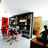 view from bedroom passage towards dining area and foyer