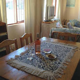 SeaBreak cottage features an airy open plan living, eating and kitchen area