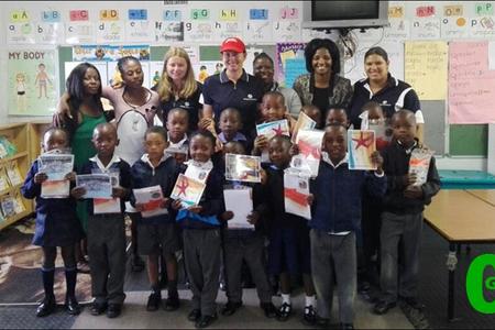 The Masakhane group of swimmers, receiving their well earned certificates from workers at the Grootbos Foundation.  