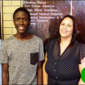 Gansbaai Academiaâ€™s Top 2016 candidate, Analo Yawa next to his proud father, Joe Nqayi (left). With them are Carien Fortuin (Deputy Principal and Grade Head) and Tommy Wilson (Principal).