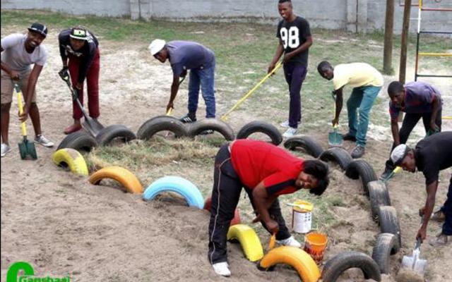 A team from Grootbos Foundationâ€™s Food Security project busy to beautify  Strandlopertjie for their  television appearance this week.  In front is Anchelle Damon, from the Grootbos Early Chilhood Development Programme, with - from left:  Pontsho Chiloane, Vuyo Khonkco, Olwethu Sikhotshi, Lindile Xabenolini, Odwa Khutshwa, Zuko Mlonyeni and Luyanda Pinikiso. 