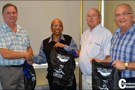 Overstrandâ€™s Manager of Solid Waste, Johan van Taak, was seen recently handing over re-usable bags to Overstrand Mayor Rudolph Smith, Deputy Mayor Dudley Coetzee and Municipal Manager Coenie Groenewald.