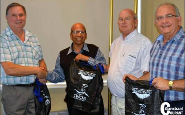 Overstrandâ€™s Manager of Solid Waste, Johan van Taak, was seen recently handing over re-usable bags to Overstrand Mayor Rudolph Smith, Deputy Mayor Dudley Coetzee and Municipal Manager Coenie Groenewald.