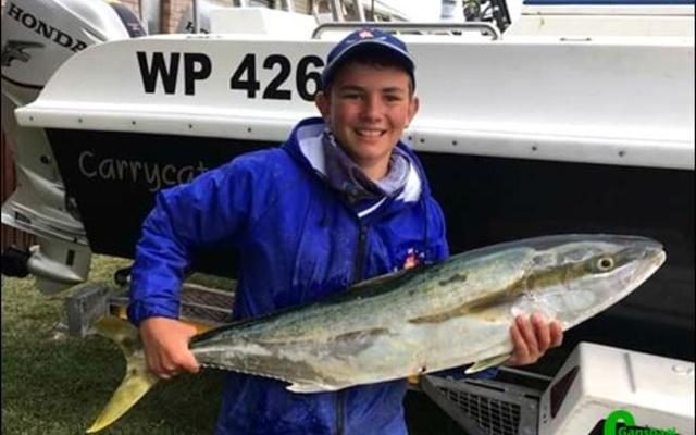 Divan Burger met 'n geelvis van 9.09 kg.