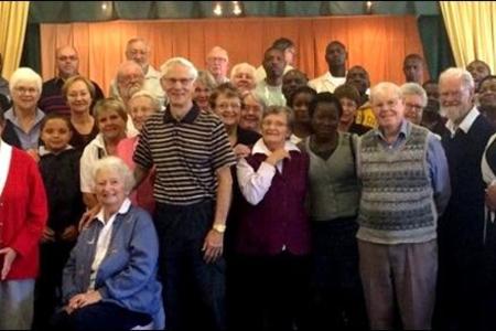 Attending members and visitors gathered together for a photo after last Sunday's service at the Gansbaai Family Church to commemorate the growth of the Church since 1995.  The Church started as an informal get together of a handful of English speaking Christian followers who initially met in the Dutch Reformed Church Hall. From there they moved to the Library Hall then the Information Centre. The Church was constituted in 2002 and was finally able to purchase the property it now occupies in 2012.  Membership has meanwhile grown to 50 people and at any one service attendance could be between 40-60 people.  As part of their fundraising drive this year, everyone was given a talent of R100 to increase by September this year, by using their own God given gifts and talents.