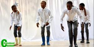 Die â€œGumboot Danceâ€ tydens die Cultivaria-aand, met Sinawo en sy Manne. 