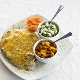 Cheddarmelt Chicken Schnitzel with vegetables at Boathouse Gansbaai