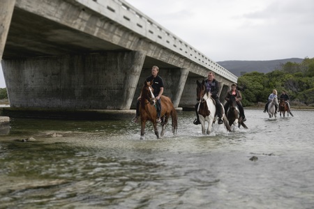 gansbaai_things_to_do_outdoor_adventures_horse_riding_gansbaai_passing_the_bridge_1497859856