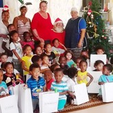 Father Christmas poses with the whole school