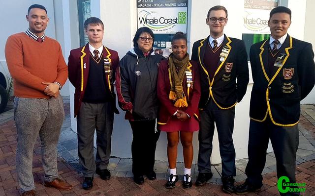 Gansbaai Academiaâ€™s Team G-Force find themselves among the top 6 schools participating in the National CharterQuest CFO Junior Competition. This photo was taken after their interview with WhaleCoast FM. From left Wilton Phillips (Mentor and Accounting teacher), Jacques Prins, Mona Matthews (English teacher), Khanya Xalisile, Heinrich van der Merwe and Llewellyn Davids.    