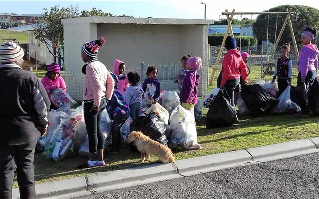 Eluxolweni children next to Pearly Beach brought their recyclable materials which they collected to the first swop shop in Eluxolweni where they exchanged it for tokens to buy needed items.