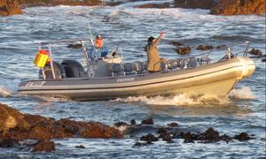 Die skipper, sy boot en sy 'crew'