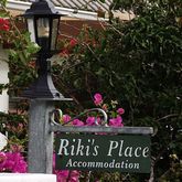 At Rikis Place Sign