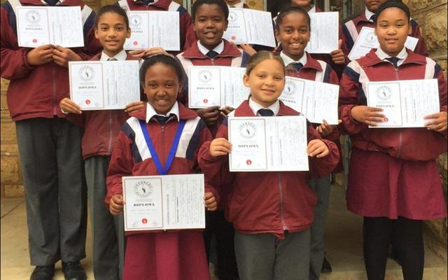 The  Marimba band of Okkie Smuts Primary School recently won the Overberg Eistedfodd primary school section with 95% (Cum Laude). Back from left: Damian van Heerden, Jade Coetzee, Kia McKay, Nicole Dreyer and Nahum Plaatjies.  Middle: Erin Dreyer, Busisiwe Mhlontlo, Kelsey Montagu and Sade October.  Front: MichÃ© Damon and Kim McKay.