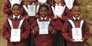 Overberg Eisteddfod Poetry from left. Back: Oyama Kosi (Green Poetry), Erin Dreyer (Silver Poetry)  and  Chantal  van  der Poll (Silver Poetry). Middle: Saydin Rooi (Silver Poetry) and Sarah Staples (Silver Poetry). Front: Likho Poni (Silver gedig), Nozipho Ngwenya (Silver Poetry) and Nipho Mcinjana (Green Poetry).