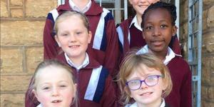 Poetry and Sight Reading learners - from left. Back: Emma Privett (Gold Poem and Gold plus Sight Reading) and Rachel Horn (Gold Poem, Silver plus Sight Reading). Middle: Ezra Matthee (Silver plus Poem) and Tandiwanashe Mushata (Silver plus Sight Reading). Front: Samantha Horn (Silver Poem) and Emily Stafford (Cum Laude Sight Reading).