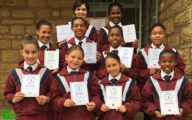 English Poem's Grade 4 - 7 learners from left - back: Jade Coetzee (Cum Laude Poetry) and Misokuhle Zondeka (Gold Poetry). Middle: Carey-Leigh Cornelius, Nicole Dreyer, Kelsey Montagu (Gold Poetry) and Sade October (Cum Laude Poetry). Front: Nina van Zyl, Kim McKay (Gold Poetry), Abigail Barkhuizen and Lokho Poni (Cum Laude Poetry).