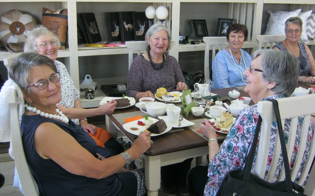 Ladies enjoying their meals