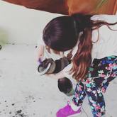 Learning to clean the horses feet