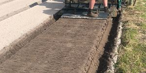 Bed forming plate behind rotavator for Madron farming Stanford