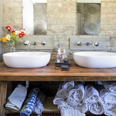 Earthy bathroom from dining table