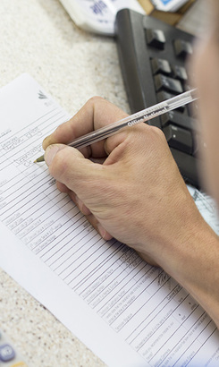 kleinmond_home_home_television_bayside_electronics_completing_paperwork_1540367981