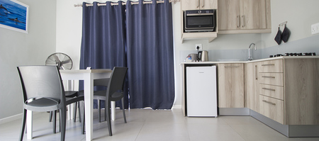 kleinmond_accommodations_kleinmond_lodge_living_space_for_wheelchair_friendly_room_1552392735