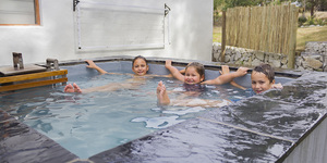 kleinmond_accommodation_njr_nuwejaarsfarm_chilling_at_heated_pool_1559650935