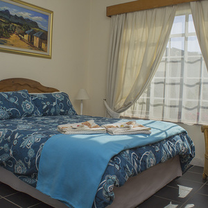 kleinmond_accomodation_the_wild_fig_main_bedroom_housr_one_1532344836_1564574701