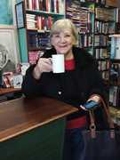 Client Having a Cup of Tea in her Favourite Bookshop