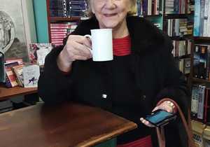 Client Having a Cup of Tea in her Favourite Bookshop