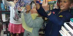 gansbaai_book_exchange_kids_reading_3_1565943998