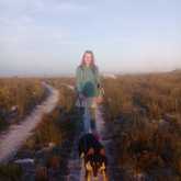 Dog walker -  with Cleo enjoying a stroll - Grace House and Pet Sitting - Xplorioâ„¢ Gansbaai